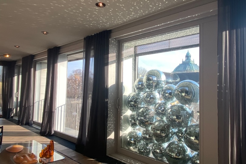 Blackspace's office, a window filled with mirror balls and a view of Munich